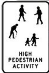 警告标志:黑色边框,内有行人、儿童、骑行者剪影与「HIGH PEDESTRIAN ACTIVITY」字样。